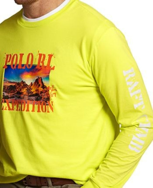 Translation missing: en.A close-up of a person wearing a bright neon yellow long-sleeve shirt with a large multicolor graphic on the chest reading 'POLO'EXPEDITION' and white text down one sleeve reading 'RAFT CAMP'