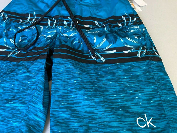 Translation missing: en.Calvin Klein Men's Floral-Print Upf 50+ 10" E-Board Shorts in Skydiver Blue-Smal