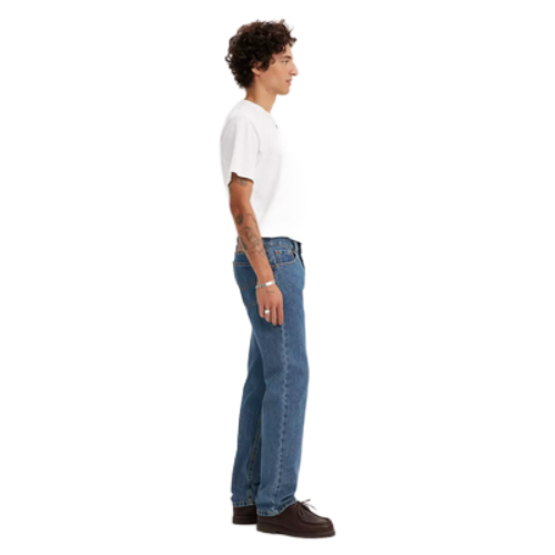 Translation missing: en.A side-profile view of a person wearing a white short-sleeve t-shirt, blue jeans, and dark brown leather shoes against a plain white background