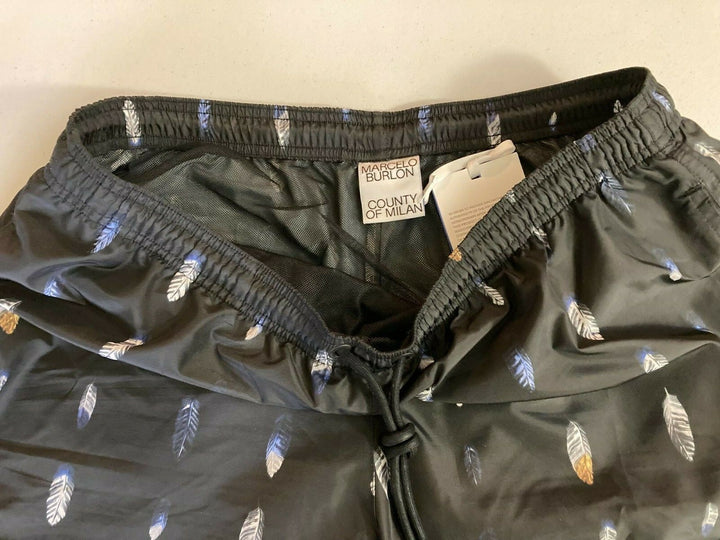 Translation missing: en.MARCELO BURLON COUNTY OF MILAN Feather-print Swim Shorts In Black-Size XL